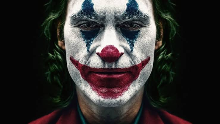 Joker Review  Socially Awkward To a Criminal Mastermind - 83