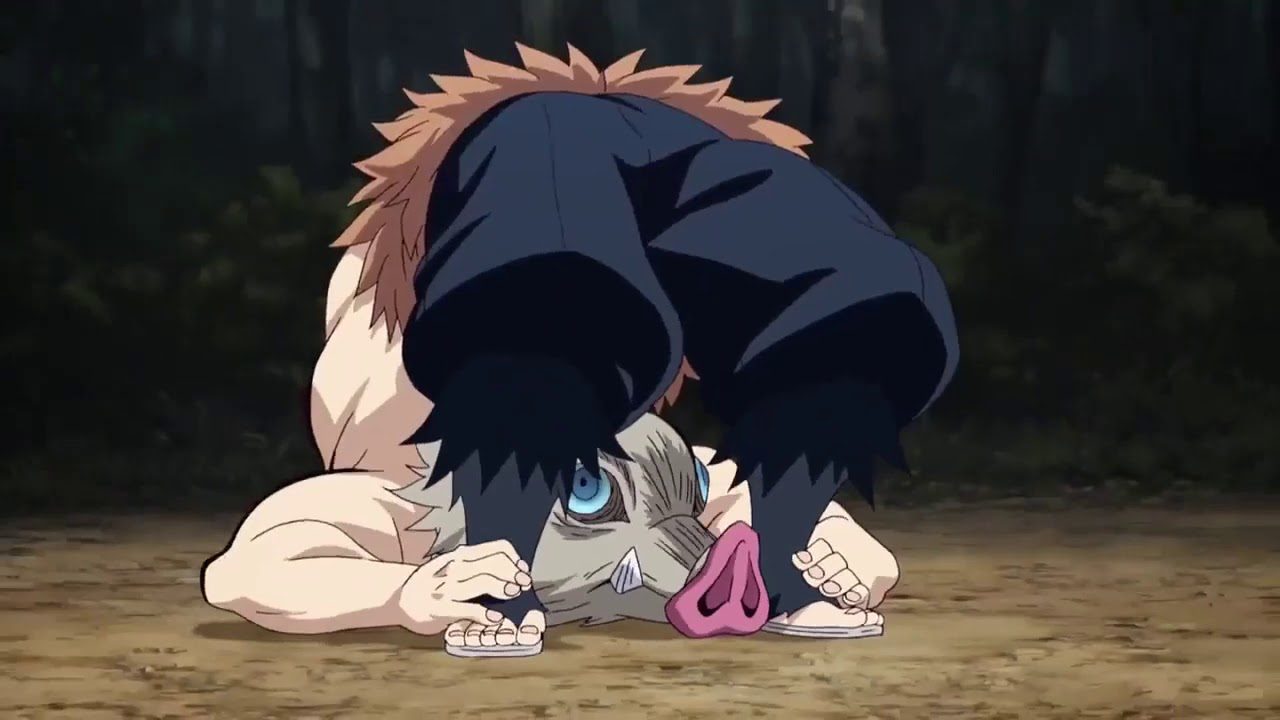 "Demon Slayer: Kimetsu no Yaiba" screenshot showing Inosuke bending over backwards to look forward from between his feet.