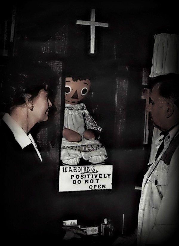 Real Ed and Lorraine Warren, next to the Annabelle doll