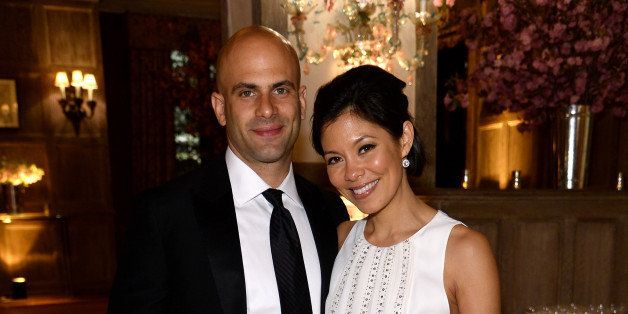 Alex Wagner (right) with husband Sam Kass( left)
