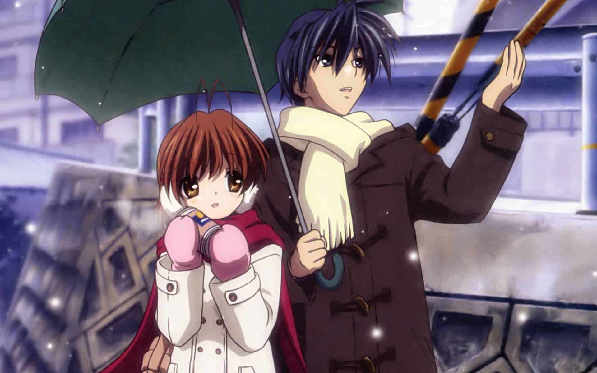 Boy holding an umbrella for the girl in a snowy day.