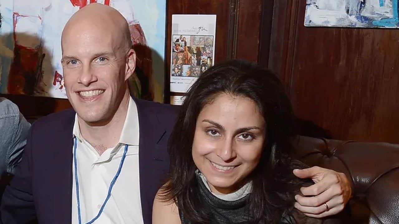 Grant Wahl (left) with wife Celine Gounder (right)