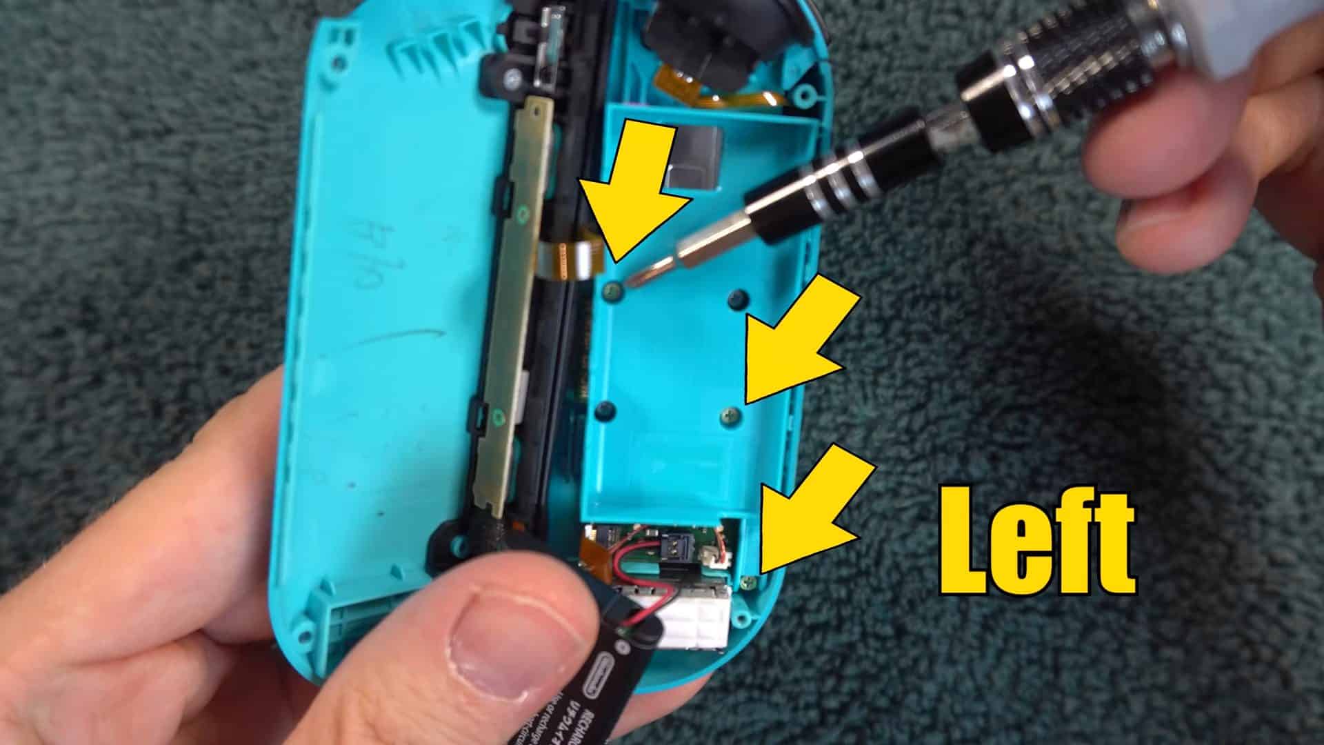 Remove 3 screws out of 5 from the left Joy-Con