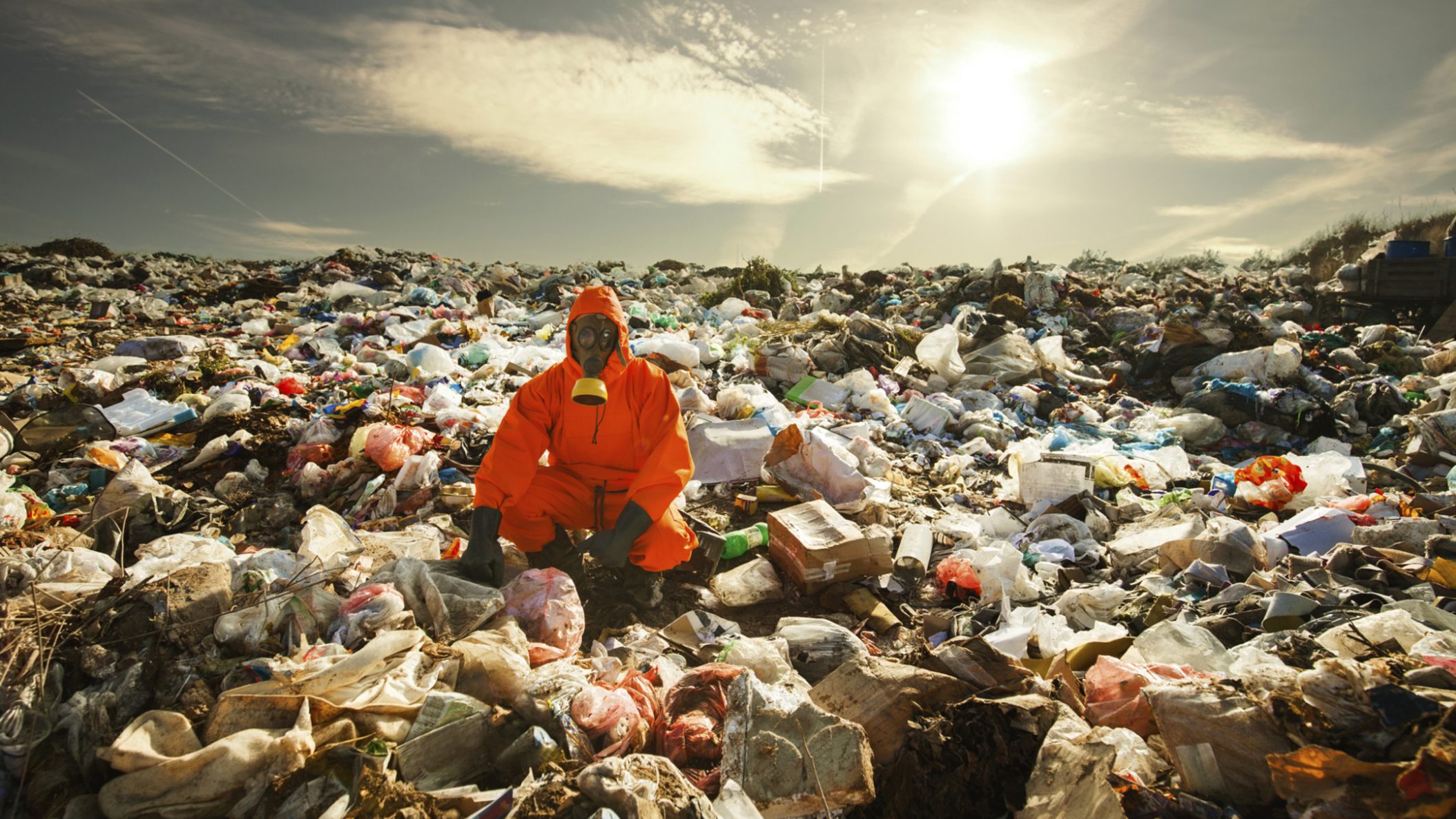 alt=" a recycling worker at a dumping yard" 