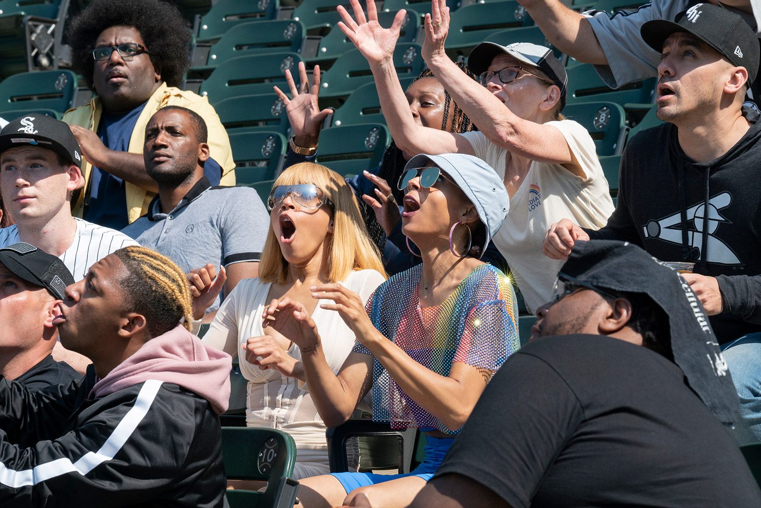alt=" The cast of South Side at the baseball match*