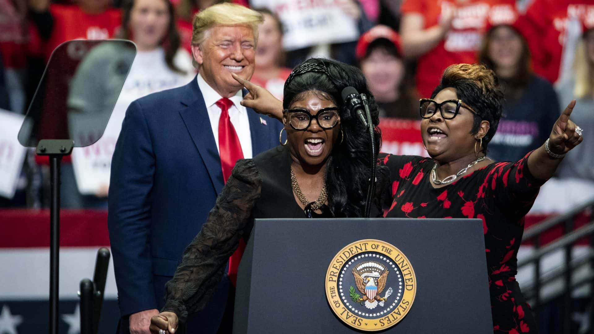 Lynette Hardaway (front) with Donald J Trump (back) and sister Rochelle Richardson (right)