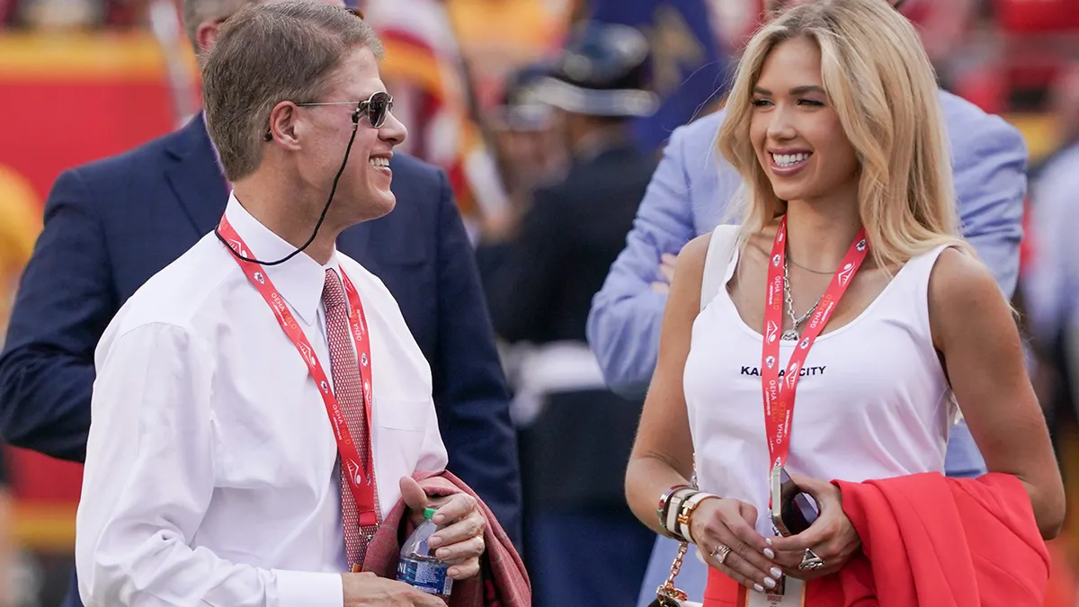 Gracie Hunt with Father Clark Hunt