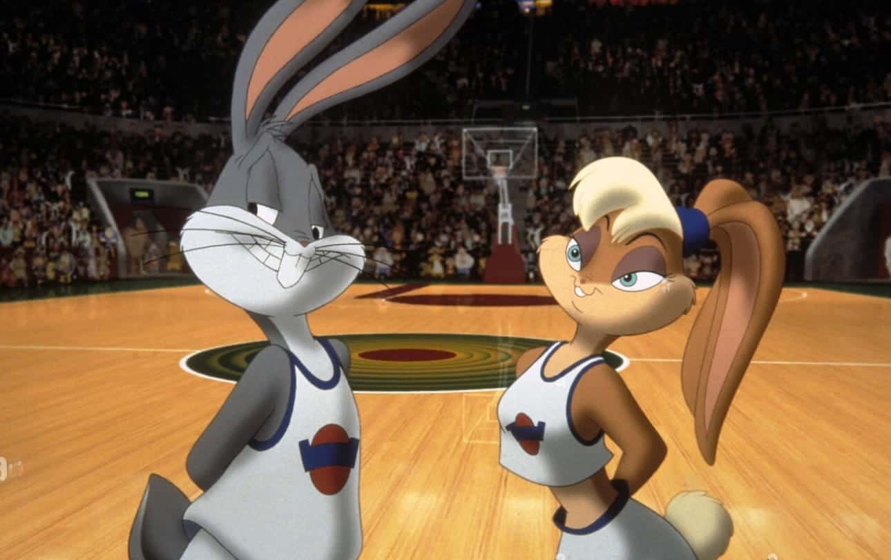 Buggs bunny playing basketball with his love interest Lola , both are looney toons characters featured alongside the legendary michael jordan in the movie Space Jam 1996