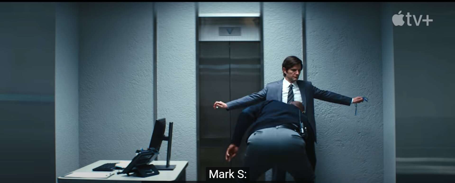 Mark entering the Severance Office.