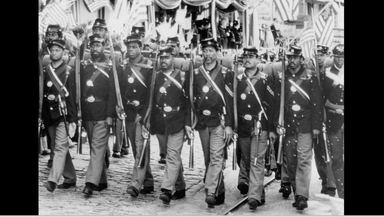 Soldiers marching towards Fort Wagner.