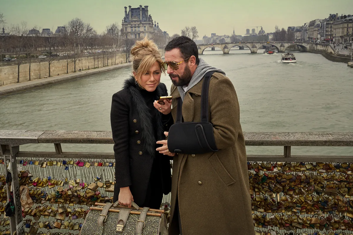 Aniston and Sandler on the Love Lock Bridge in the film, Murder Mystery 2