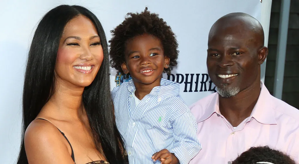 Djimon Hounsou met zijn zoon en voormalig teamgenoot Kimora Lee Simmons,