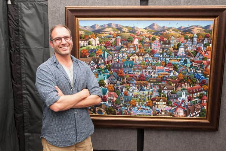 Eric Dowdle with one of his paintings (Credits: SYV News)