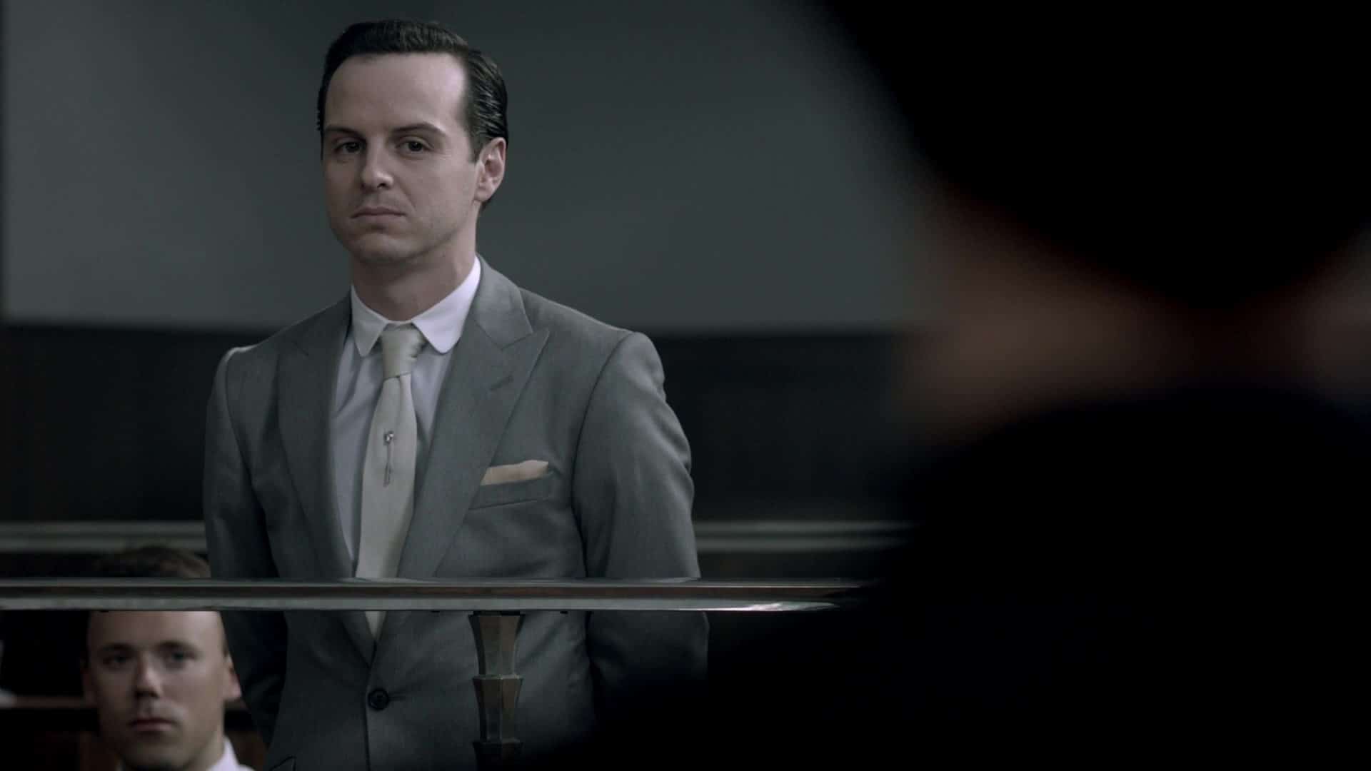 James Moriarty standing