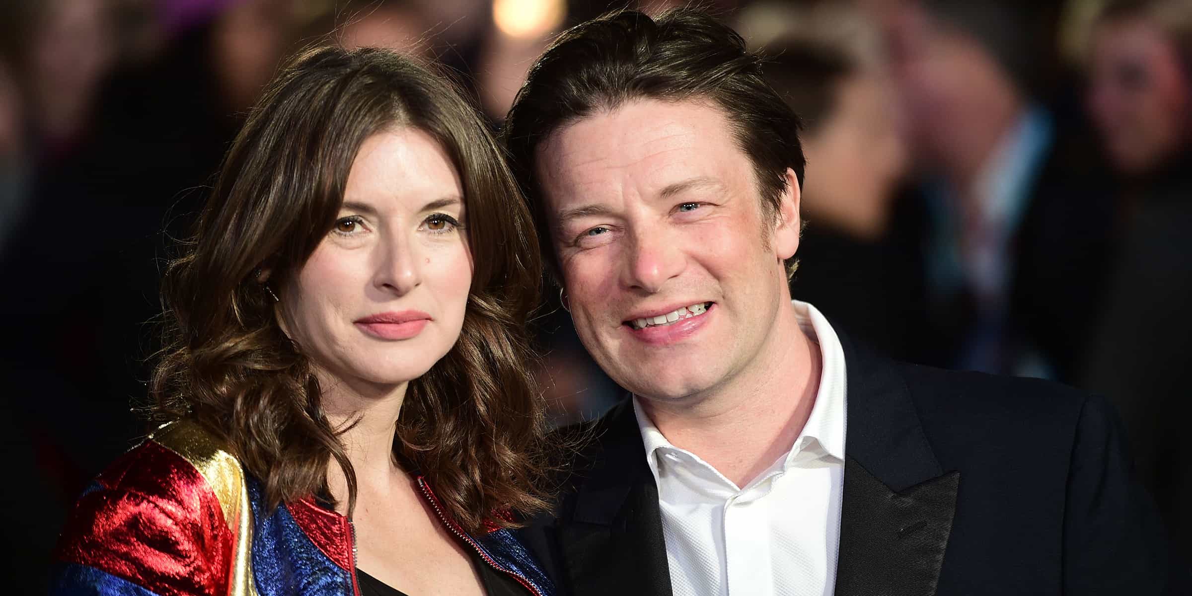 British chef Jamie Oliver (R) and his wife Juliette (Credits: Getty Images)