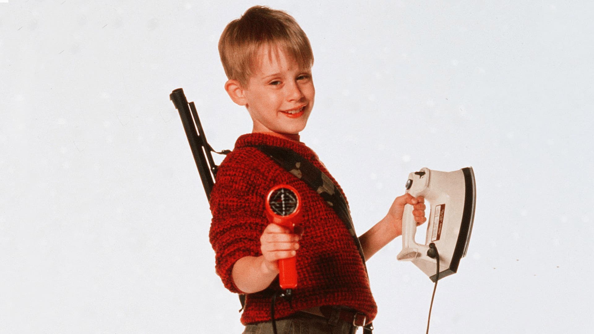 Kevin McCallister pointing toy gun at the camera