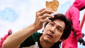 Lee Jung Jae doing a task from the drama, Squid game