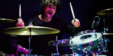Former drummer for Queens of the Stone Age, Joey Castillo.