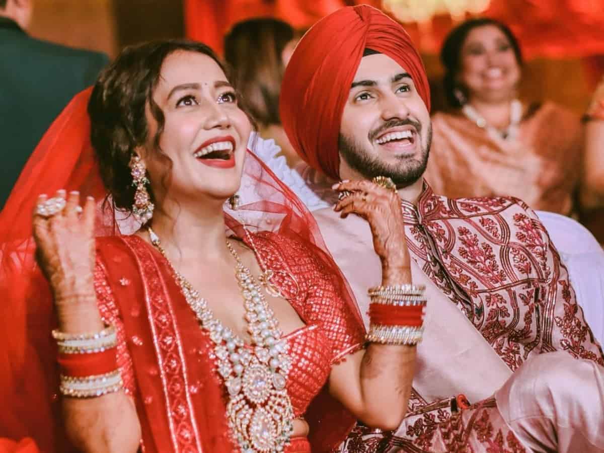 Neha Kakkar's wedding photos alongside husband Rohanpreet Singh.