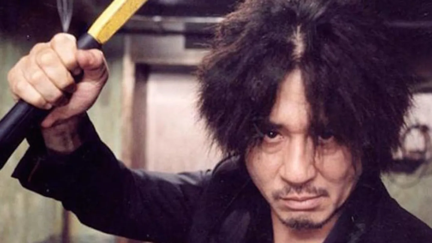 character from Oldboy wielding a weapon