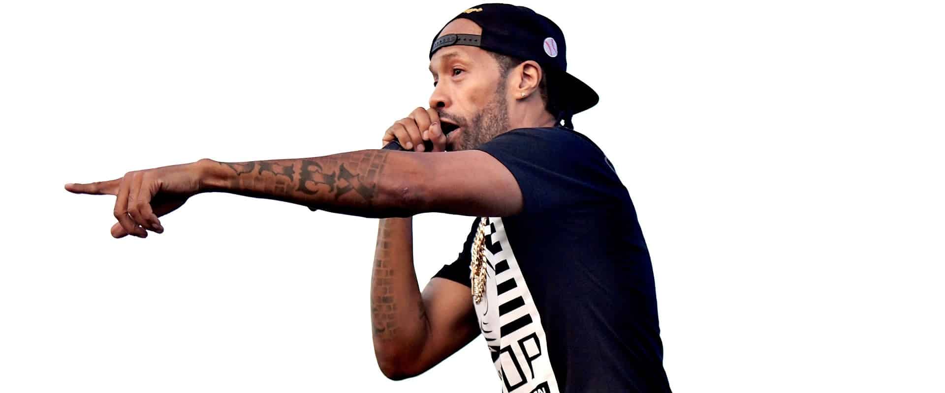 Redman performs onstage during a live concert.