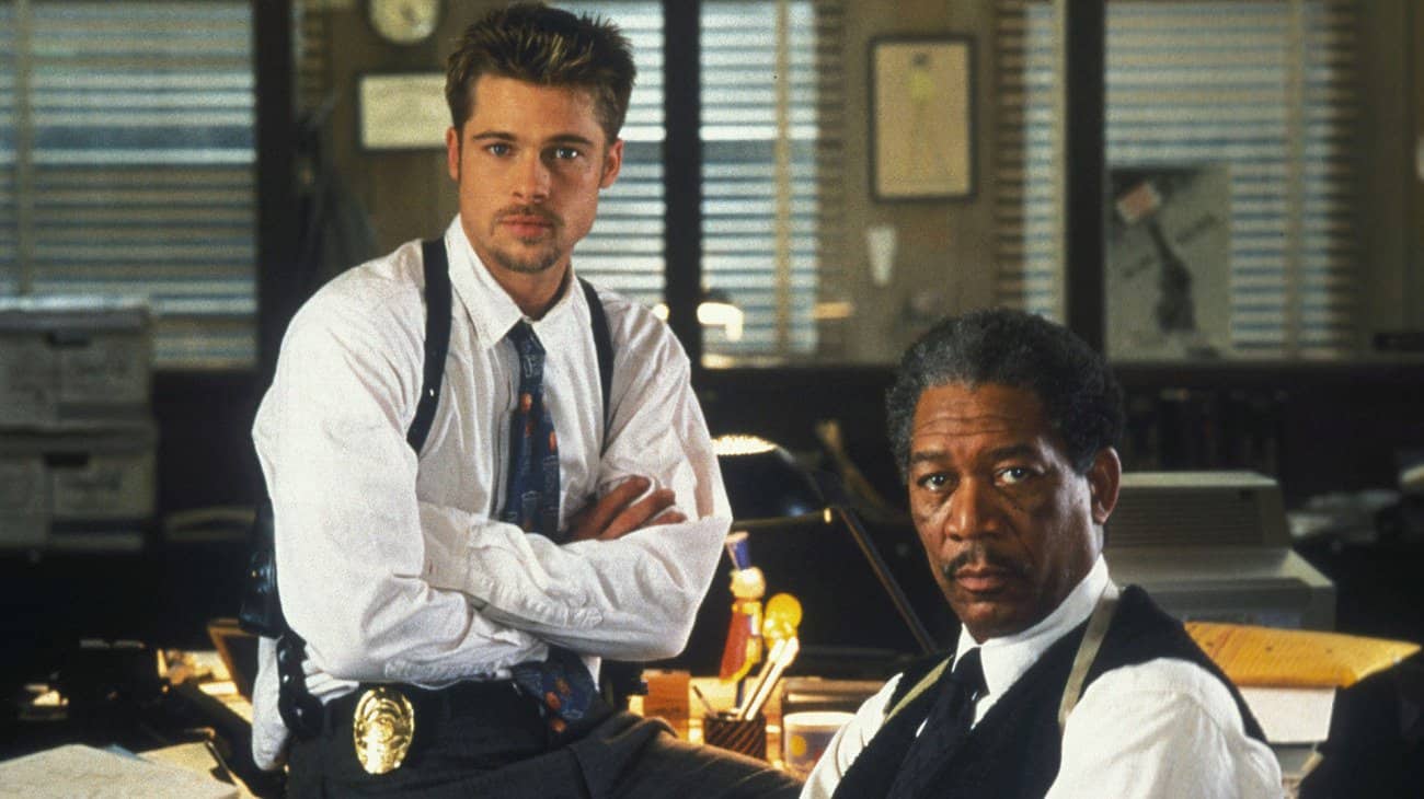 Brad Pitt and Morgan Freeman as police detective William Somerset in the film