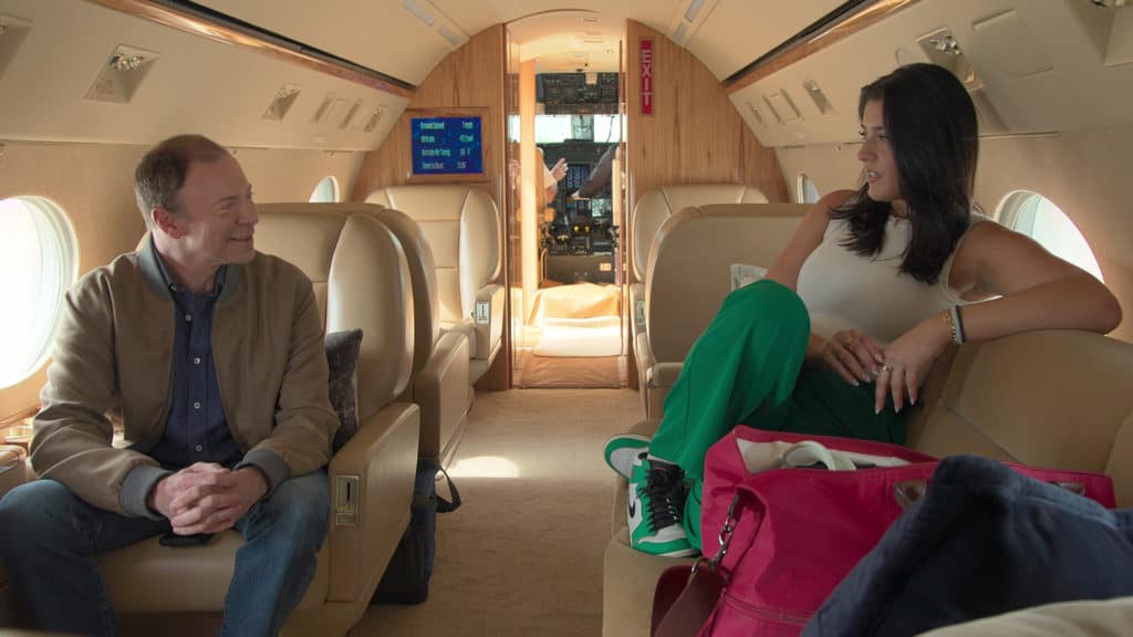 Ken Goldin with his daughter, Laura Goldin in his private jet (Credits: Netflix)