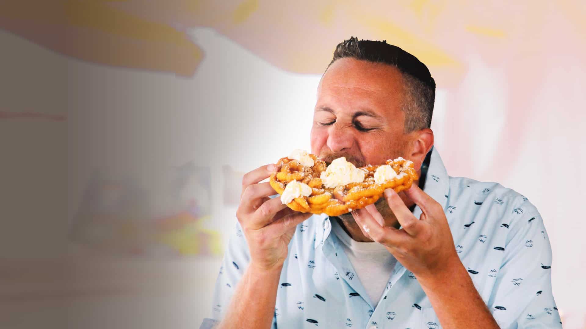 Noah Cappe in the show, Carnival Eats (Credits: Food Network)