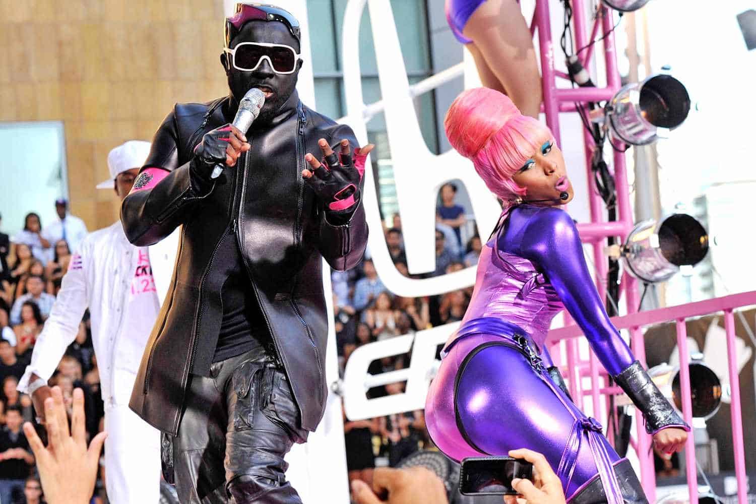 Will.i.am's performance with rapper Nicki Minaj which cause the Blackface controversy for the artist (Credits: People)