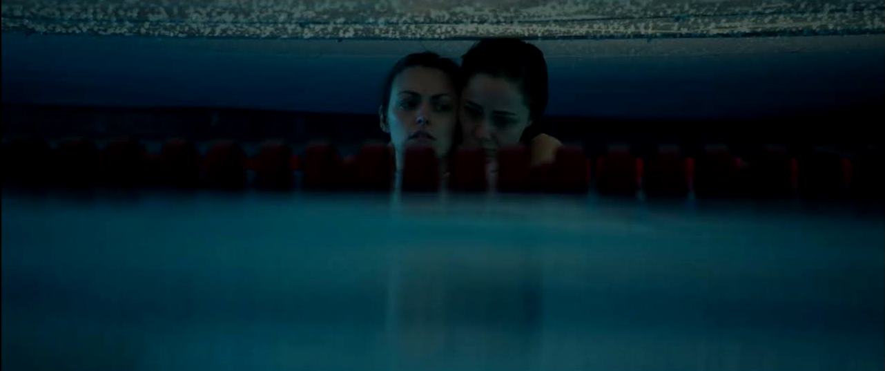 Bree and Jonna trapped in the pool (Credits: MarVista Ent.)