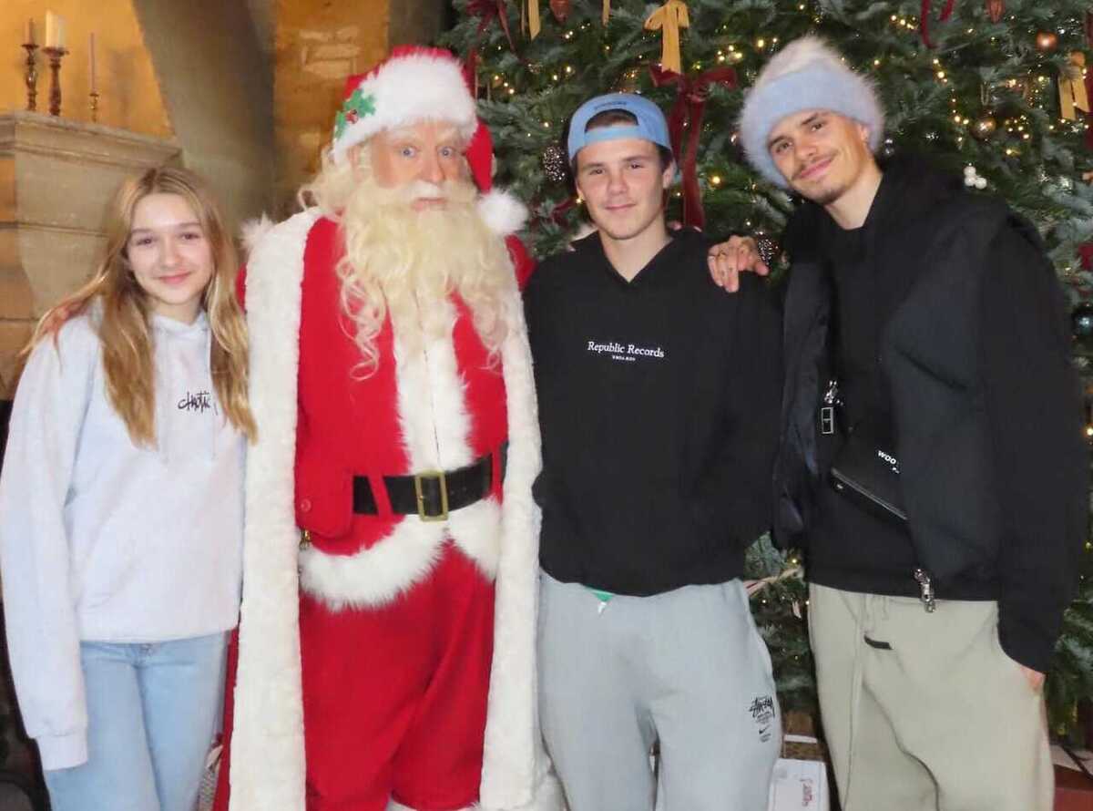 Cruz , Romeo and Harper Beckham posed with Santa Claus.