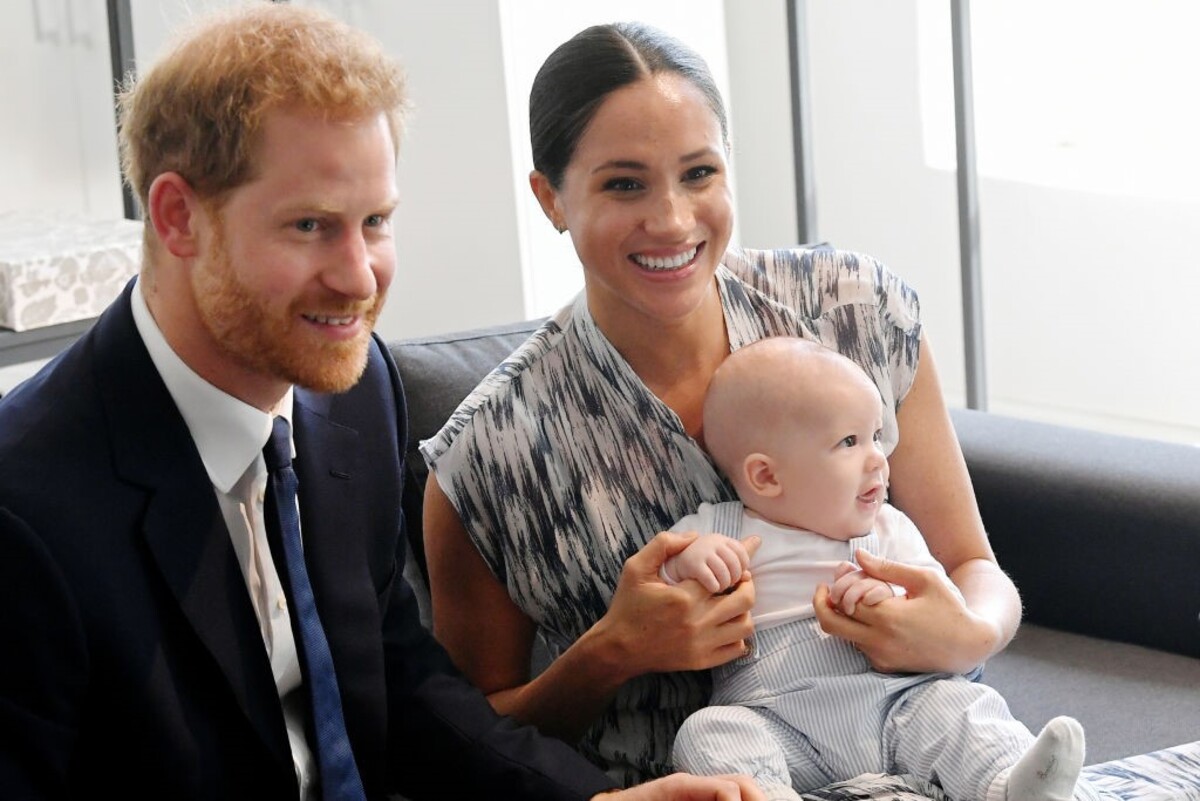 Prince Harry and Meghan Markle with son