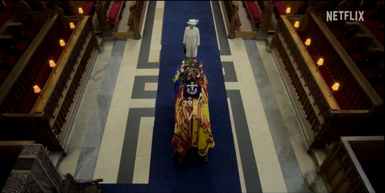 Queen Elizabeth facing her casket in the final moments of the show (Credits: Netflix)