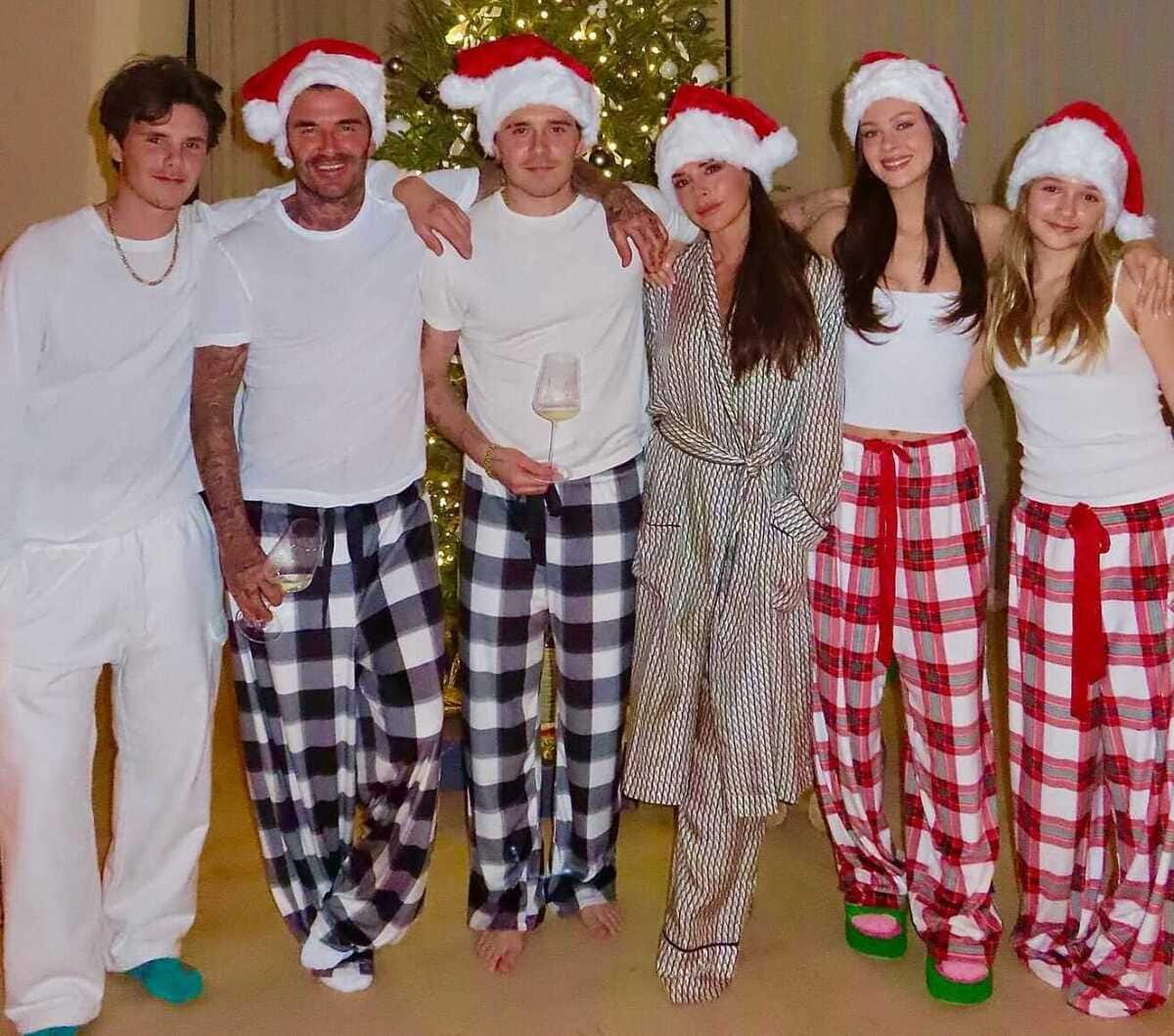 Victoria and David Beckham with family posed for Christmas.