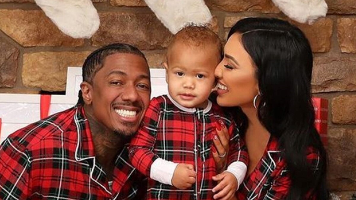 Nick Cannon and Bre Teisi poses with son Legendary for Christmas. 