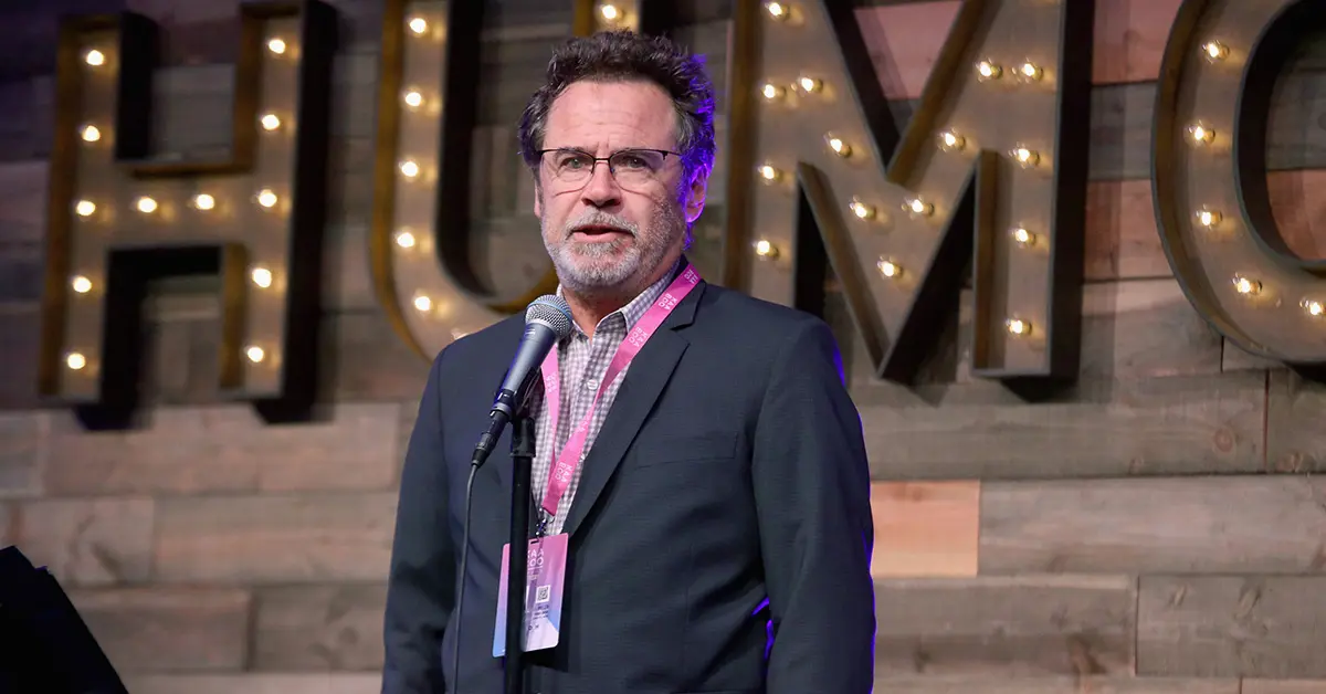 Dennis Miller performing (Credits: Distractify)