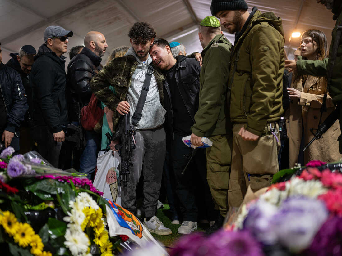Families of the dead solidiers mourn the loss in Jerusalem (Credits: NPR)