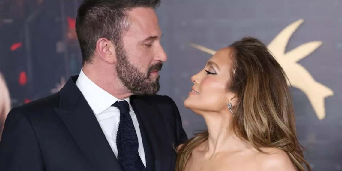 An affectionate moment between Ben Affeck and Jennifer Lopez (Credit: People)