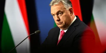 Hungary's reluctant agreement to the EU's €50 billion aid to Ukraine (Credits: The Guardian)