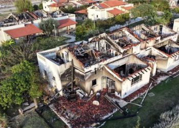 Houses are damaged following the attack by gunmen from the Palestinian military group Hamas from the Gaza Strip (Credit: Reuters)