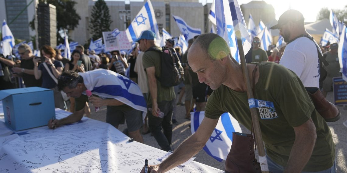 Israeli reservists take on the duty of delivering military notifications (Credits: The Times of Israel)