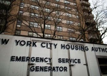 A generator provides electricity to NYCHA building having no water and heat, following the Hurricane Sandy (Credit: Reuters)