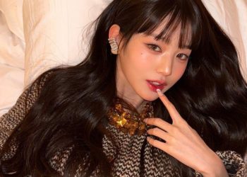 Jang Wonyoung, involved in writing lyrics for "Blue Heart", shares insights in an interview with Nylon magazine.