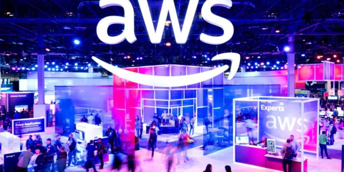 Attendees spotted walking through an expo hall at the AWS conference (Credit: Reuters)