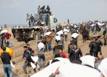 Palestinians spotted carrying flour bags as the residents of Gaza faced food crisis (Credit: Reuters)