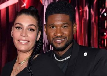 Usher and his wife, Jennifer Goicoechea (Credit: People)