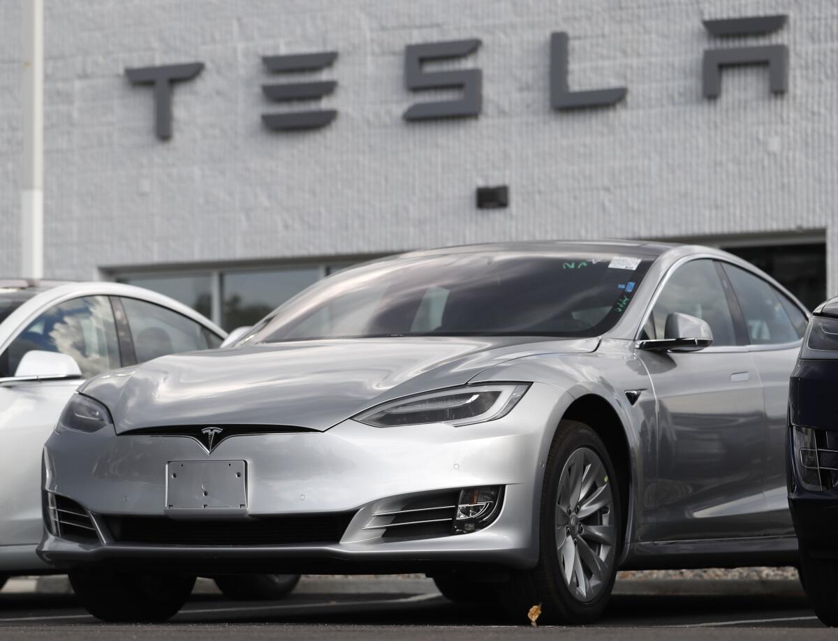 Consumer Reports urges NHTSA to mandate stronger actions from Tesla (Credits: Associated Press)