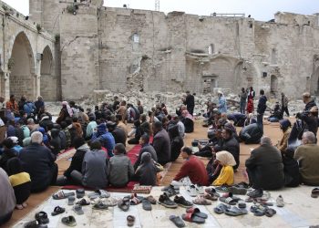 Palestinians seek solace amidst the ruins on somber Eid observance (Credits: AFP)