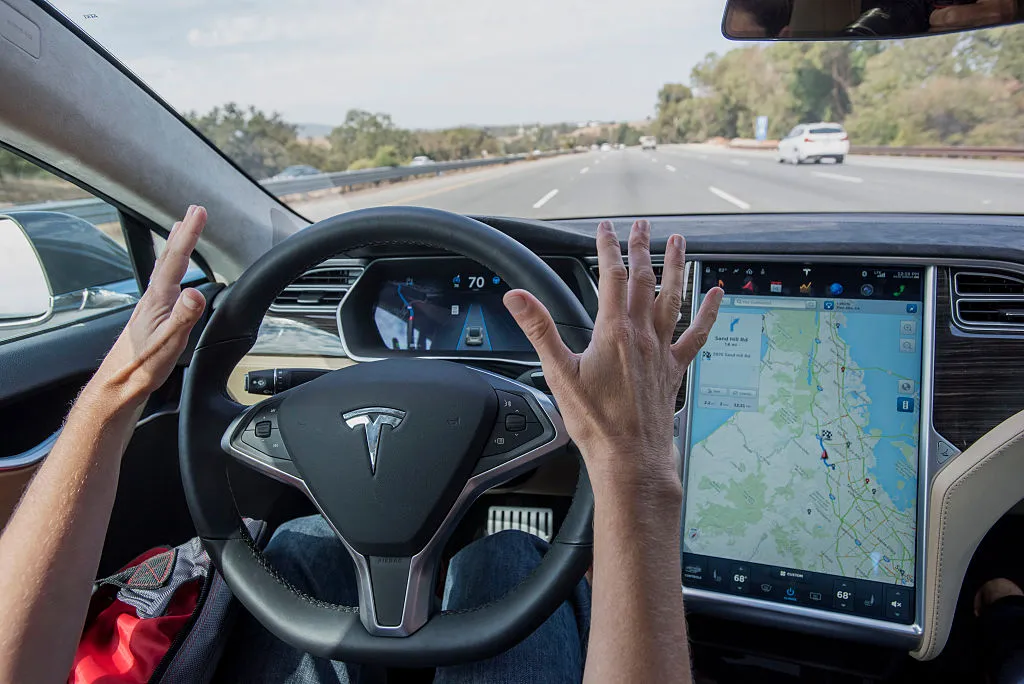 Tesla's optional features under scrutiny for driver attention concerns (Credits: Bloomberg)