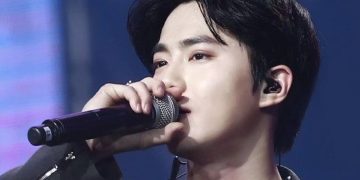 EXO members' surprise attendance enhances Suho's performance's excitement